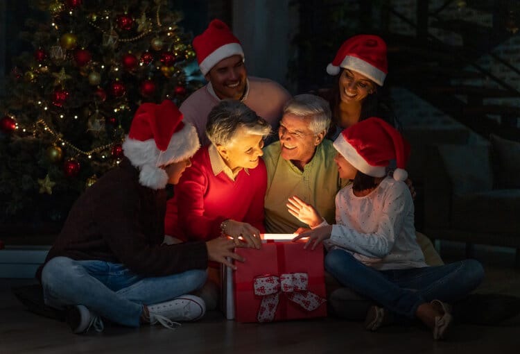 Happy Latin American Family Opening Presents On Christmas Eve